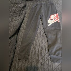 Nike Black Joggers with Red and White Logo